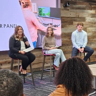 Four speakers in a career panel presentation